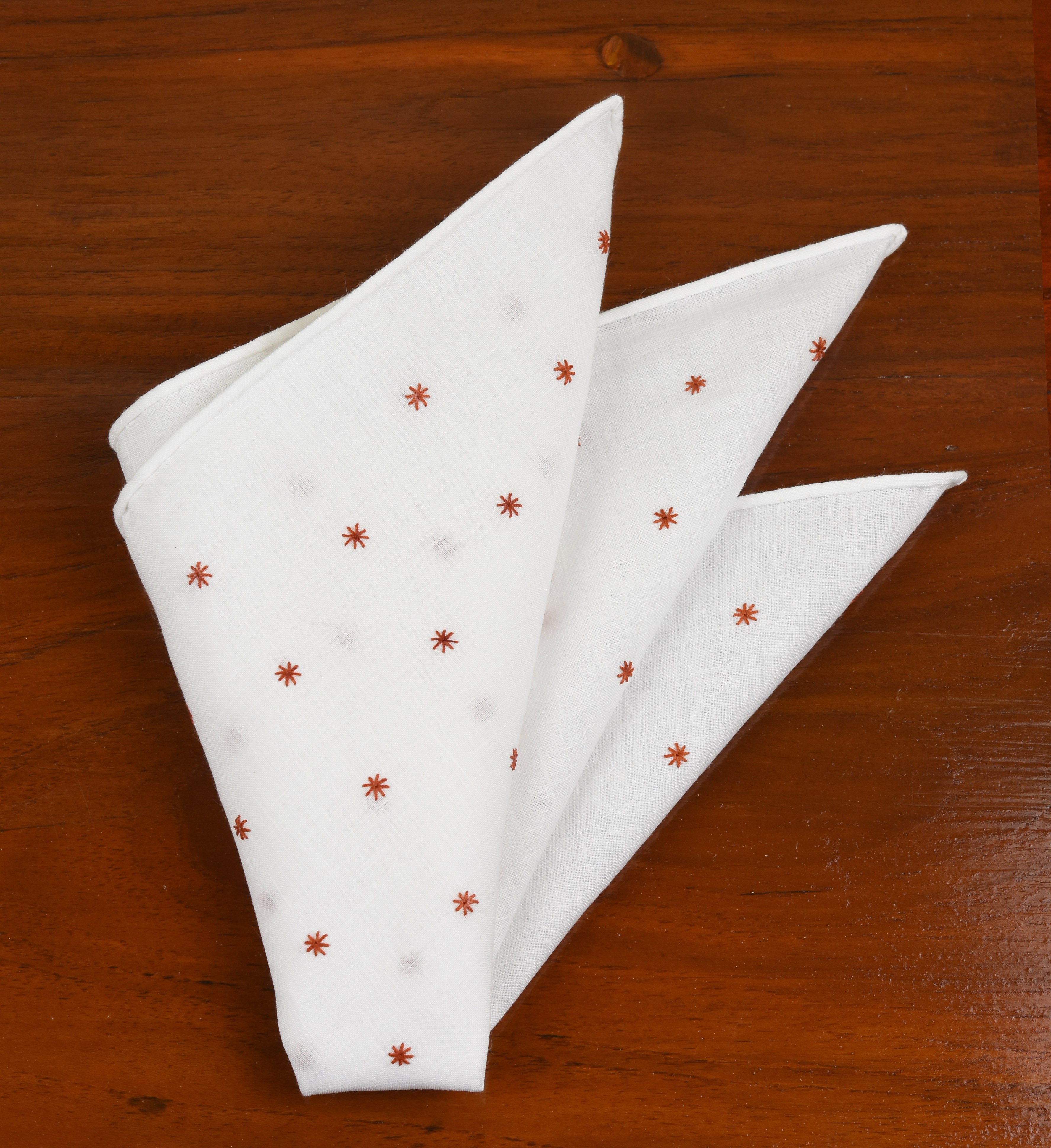 {[en]:Belgian White Linen With Burnt Orange Embroidered Stars Pocket Square