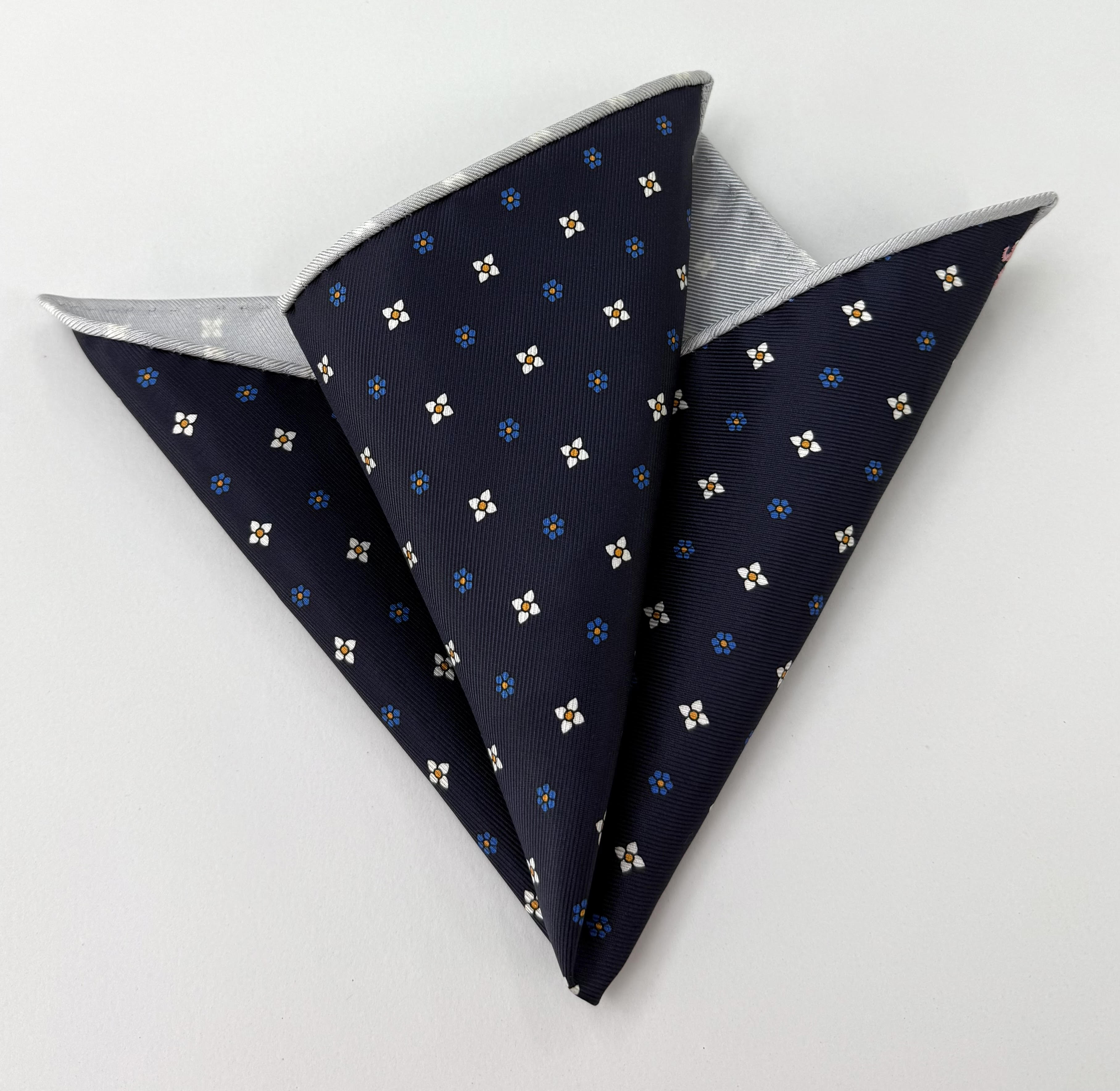 Off-white, blue and gold on Midnight Blue Macclesfield Pocket Square MCP-1
