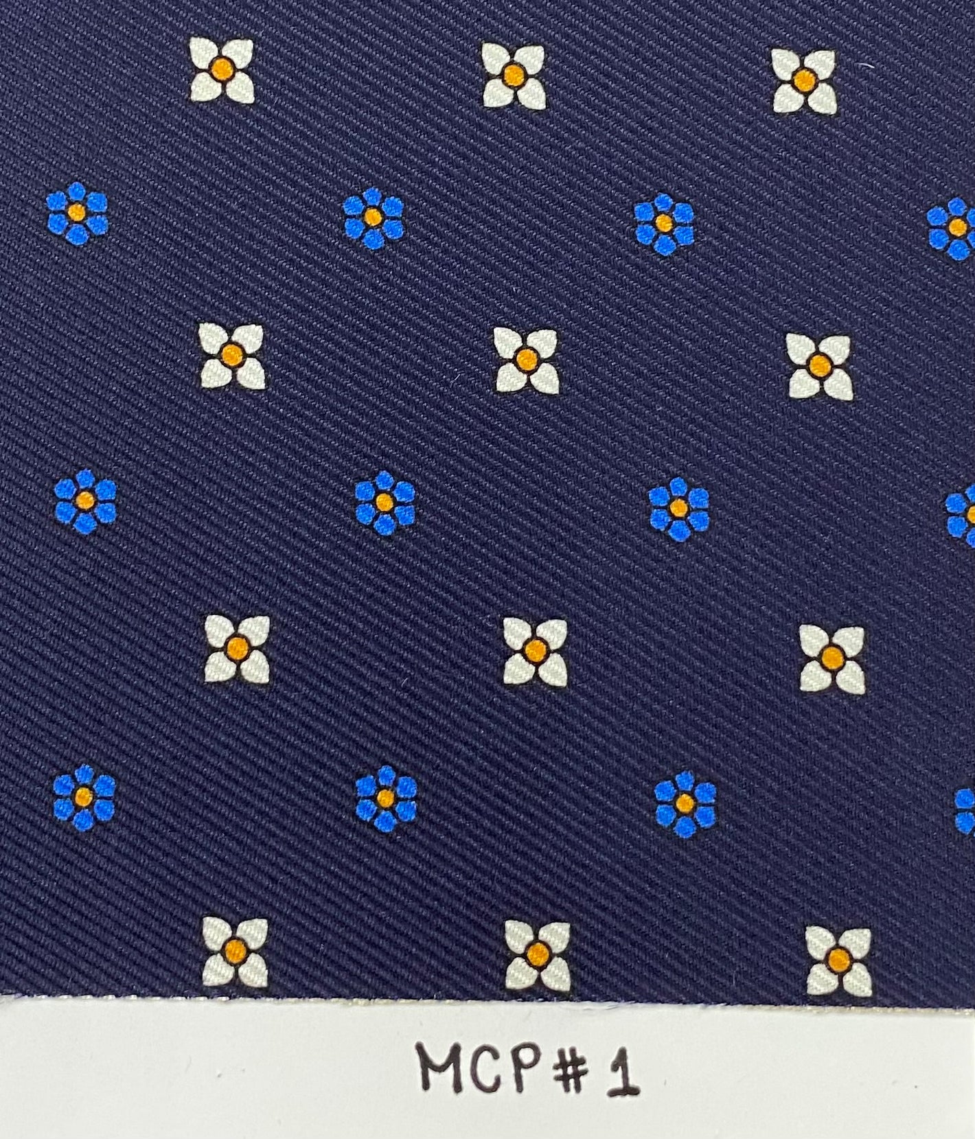 Off-white, blue and gold on Midnight Blue Macclesfield Pocket Square MCP-1