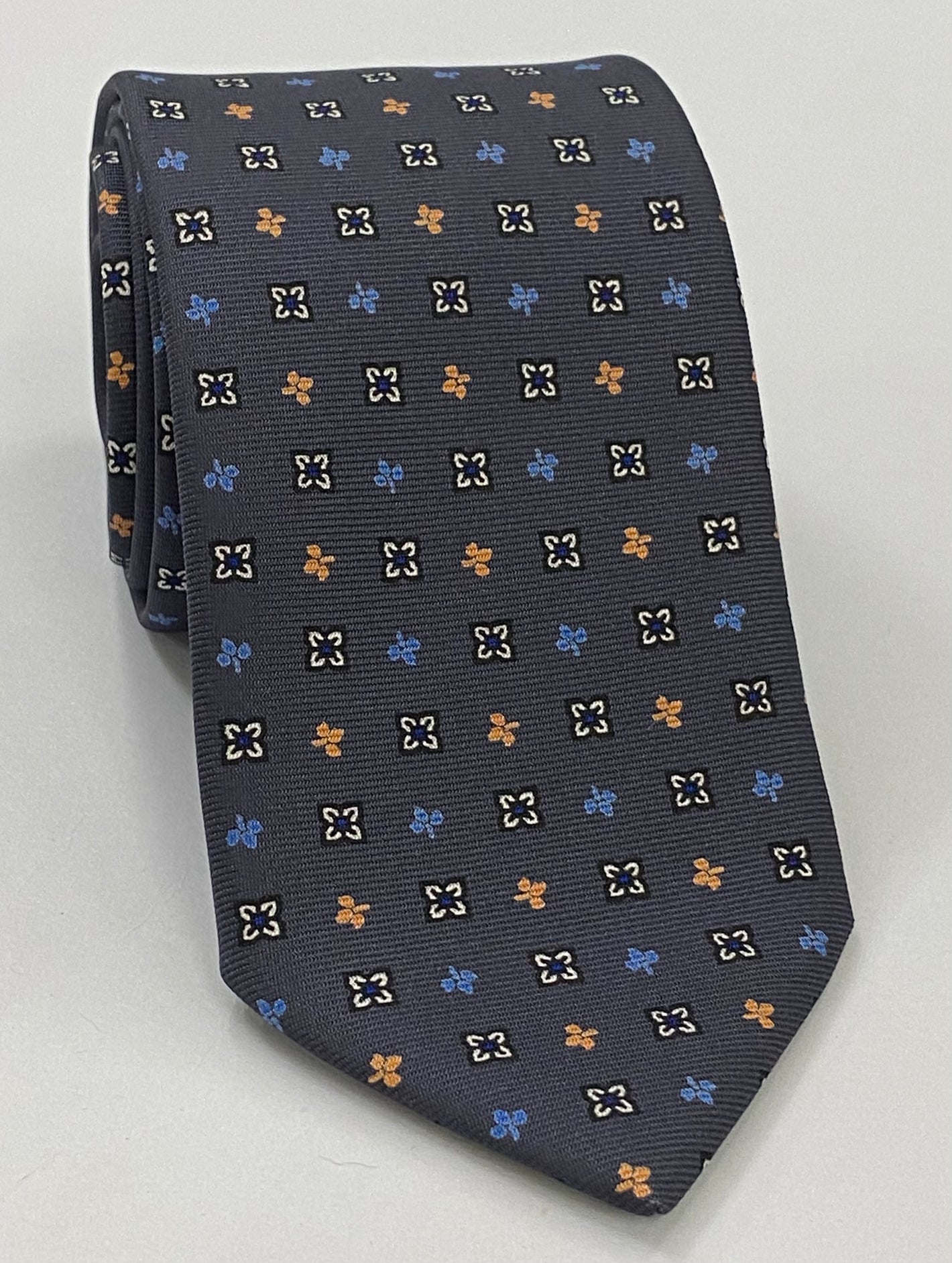 White, Blue, Powder Blue & Orange on Medium Charcoal Gray Macclesfield Printed Silk Tie MCT-107