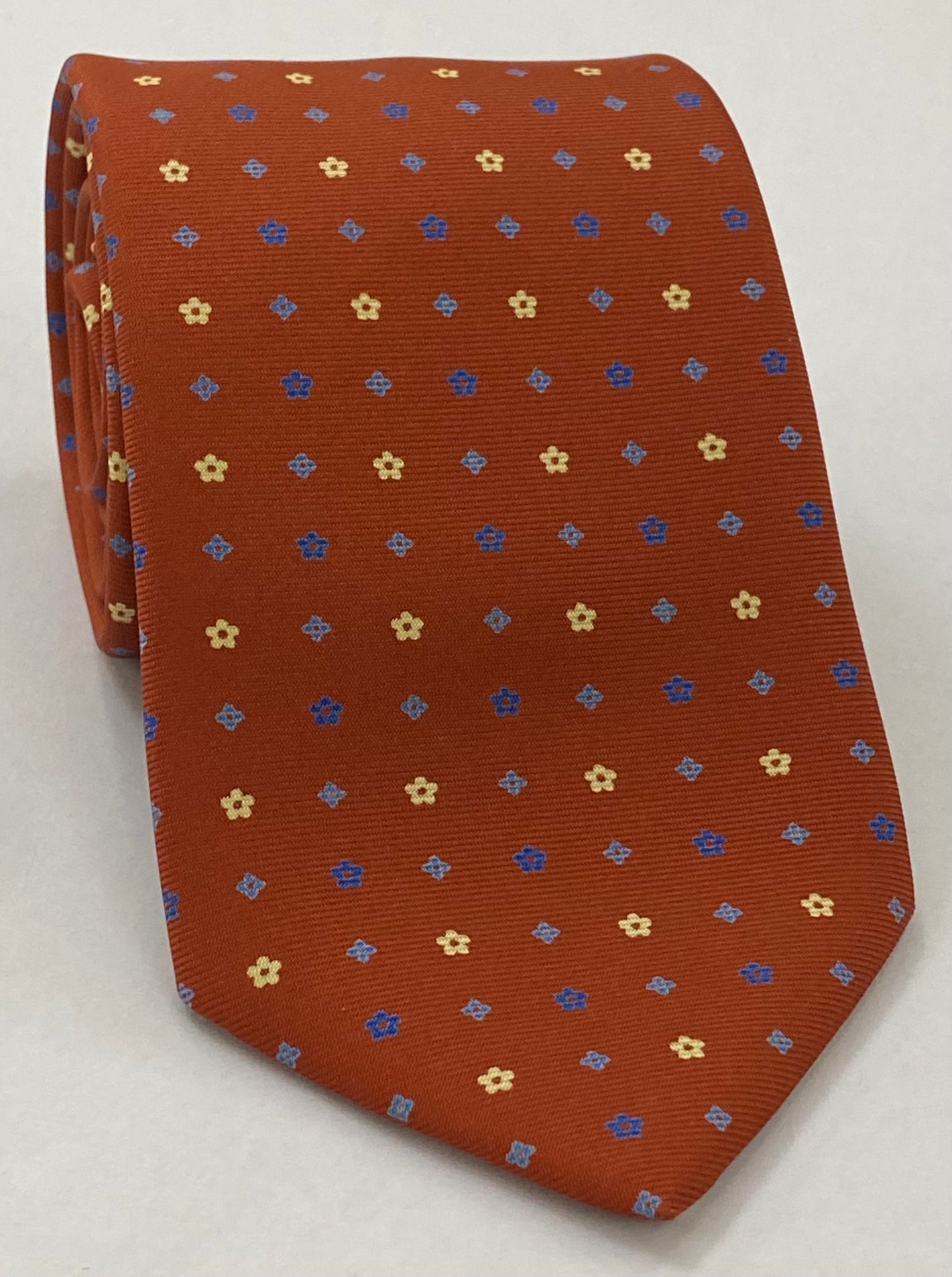 Blue, Sky Blue & Light Yellow on Burnt Orange Macclesfield Print Pattern Silk Tie MCT-503