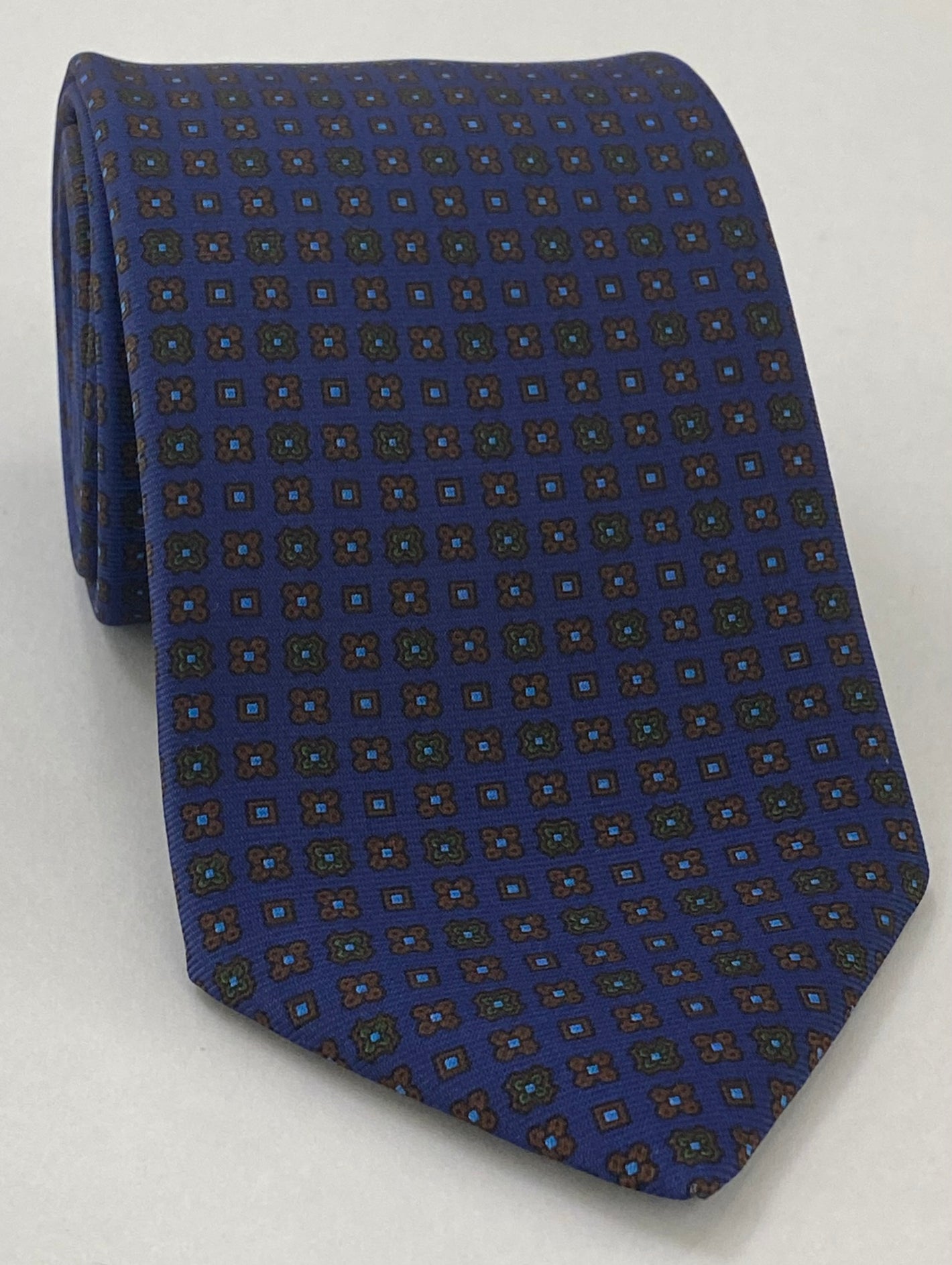 Brown, Forest Green, Sky Blue & black on Navy Blue Macclesfield Printed Silk Tie MCT-82