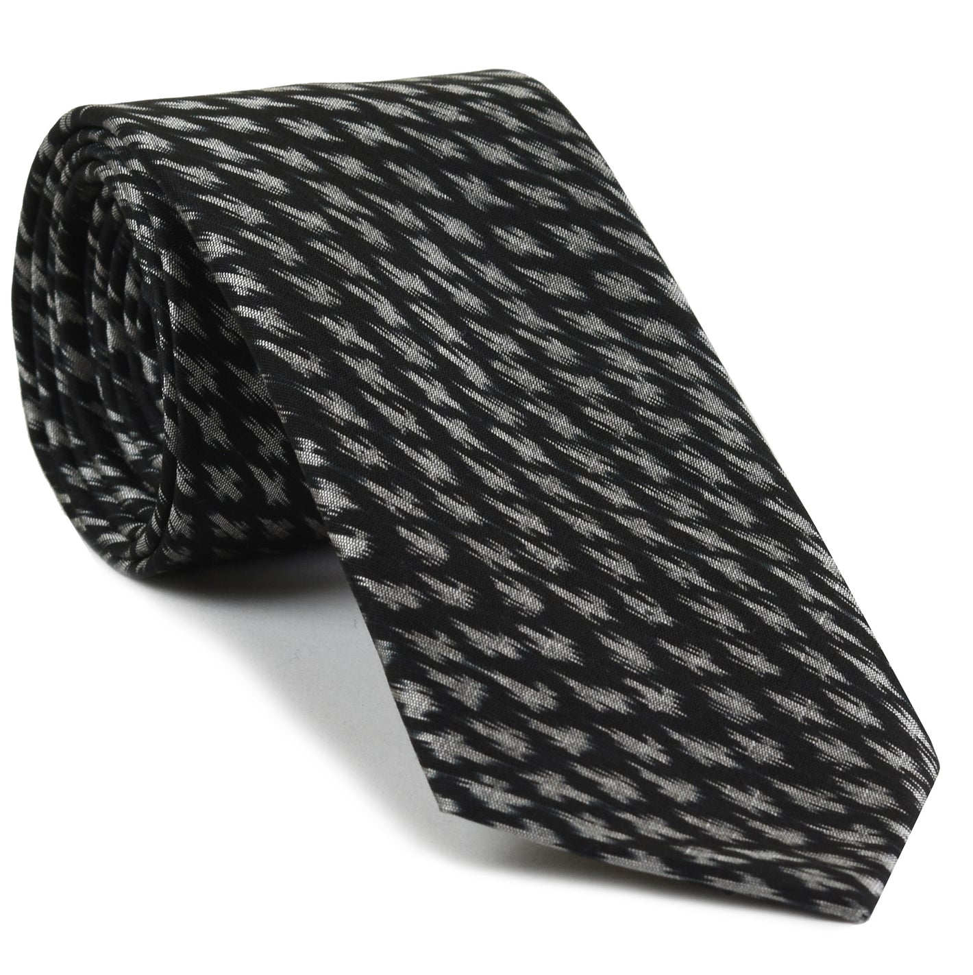 {[en]:White on Black Mudmee Silk Tie