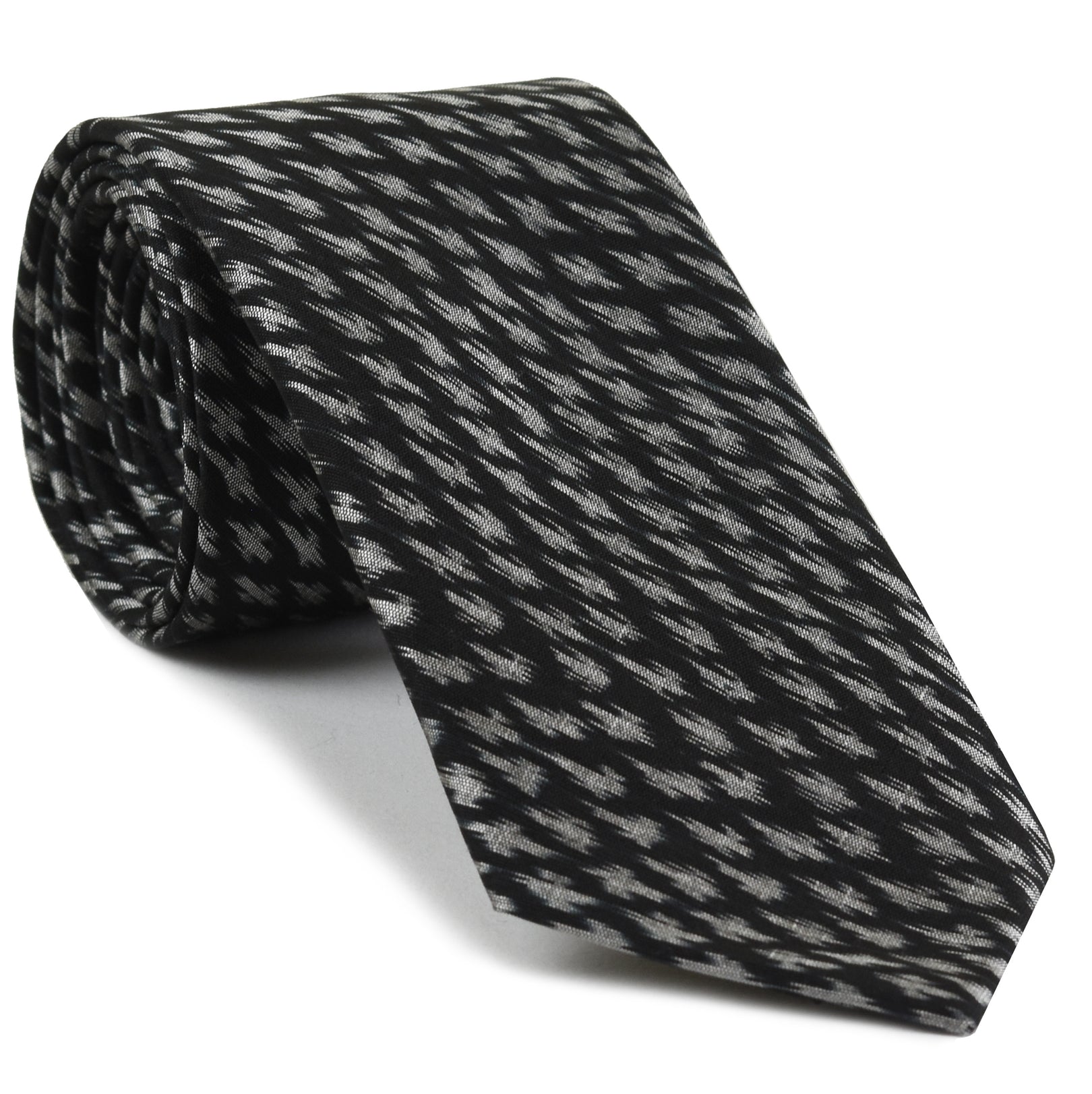 {[en]:White on Black Mudmee Silk Tie