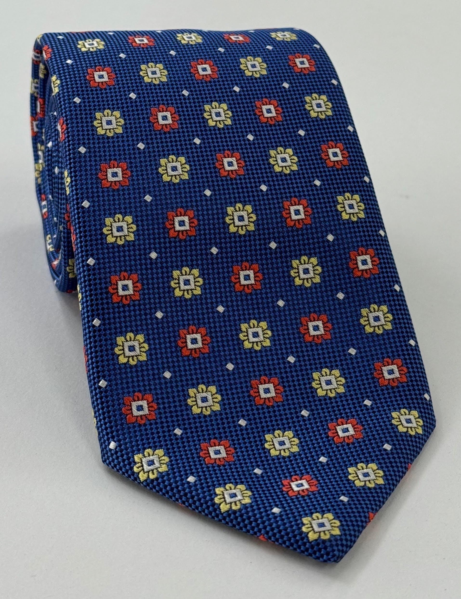 Reddish Orange, Yellow, White, Black on Blue Silk Flower Tie FT-38